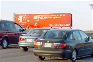 Les grands panneaux publicitaires devront disparaître pour éviter la pollution visuelle. Le Soleil, Steve Deschênes.